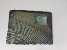 Load image into Gallery viewer, Alejandro Aguilera - Paisaje Colonial is a new addition to our online gallery.   Master work by Alejando Aguilera, an Atlanta based Cuban Born Artist. The work is a diptych.  Two wooden rectangles. One has a blue square on the upper right corner, the other black numbers printed on it. A textured wave runs through both of them.  Work is from 1995. Signed in verso. This very unique work is paint and ink on carved wood. Each rectangular work measures 14&quot; x 26&quot;.
